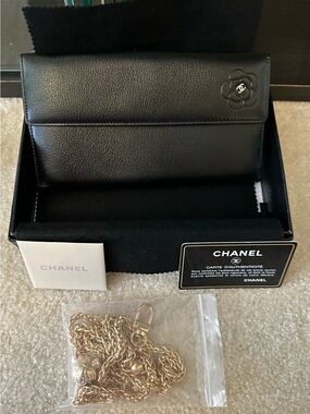 CHANEL Black Leather Wallet with Gold Chain and Camellia Detail